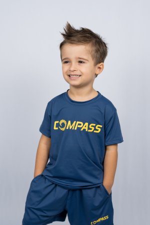 CAMISETA DRY INFANTIL MARINHO LOGO AMARELO COMPASS